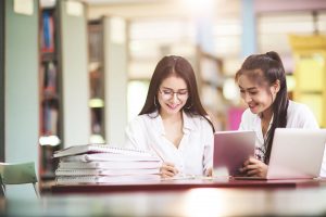 degree-in-accounting-and-finance-student-in-library